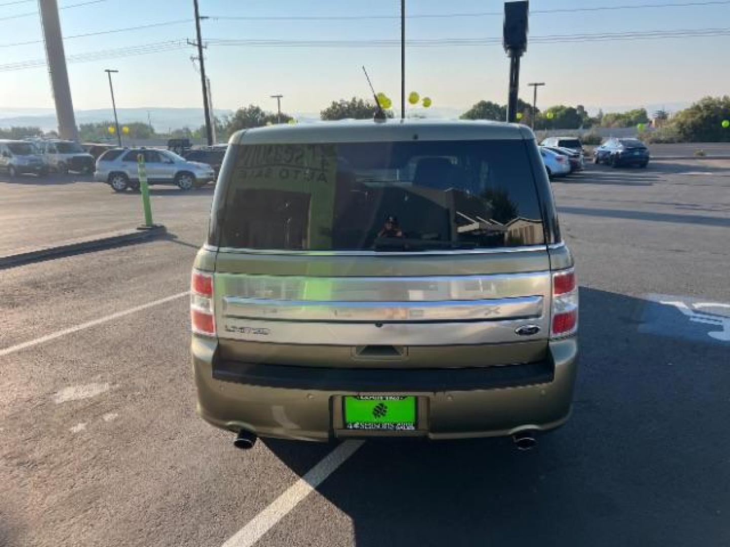 2013 Ginger Ale Metallic /Charcoal Black Leath Ford Flex Limited FWD (2FMGK5D81DB) with an 3.5L V6 DOHC 24V engine, 6-Speed Automatic Ov transmission, located at 940 North Main Street, Cedar City, UT, 84720, (435) 628-0023, 37.692936, -113.061897 - We specialize in helping ALL people get the best financing available. No matter your credit score, good, bad or none we can get you an amazing rate. Had a bankruptcy, divorce, or repossessions? We give you the green light to get your credit back on the road. Low down and affordable payments that fit - Photo#5