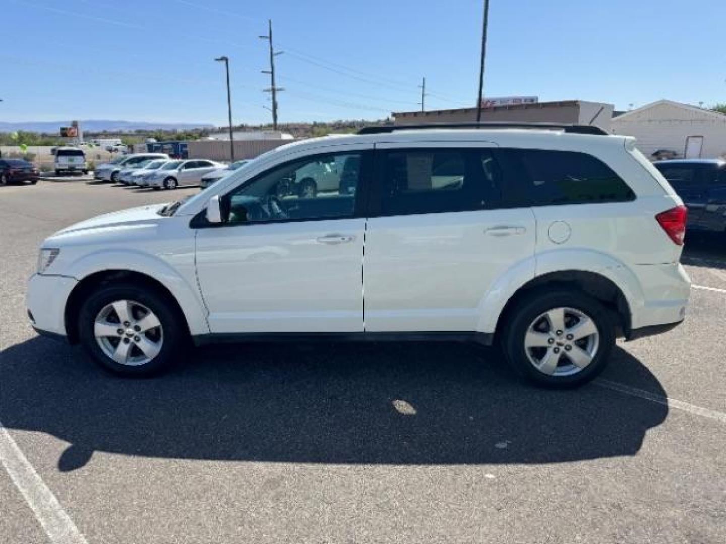 2012 White /Black Cloth Interior Dodge Journey SXT (3C4PDCBG9CT) with an 3.6L V6 DOHC 24V engine, 6-Speed Automatic transmission, located at 940 North Main Street, Cedar City, UT, 84720, (435) 628-0023, 37.692936, -113.061897 - Photo#5