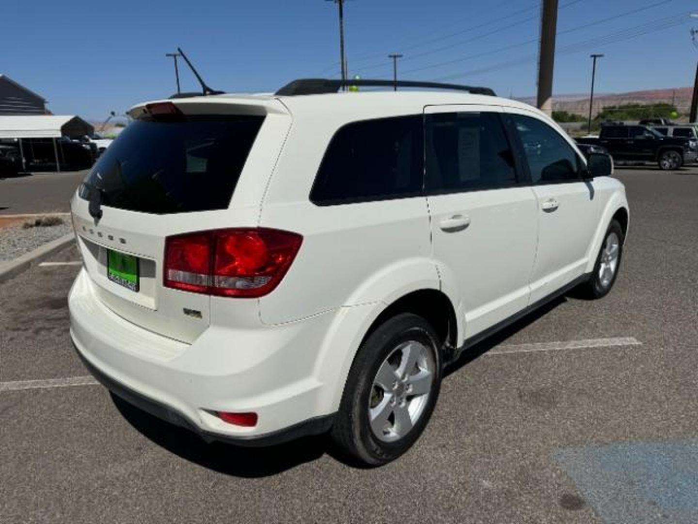 2012 White /Black Cloth Interior Dodge Journey SXT (3C4PDCBG9CT) with an 3.6L V6 DOHC 24V engine, 6-Speed Automatic transmission, located at 940 North Main Street, Cedar City, UT, 84720, (435) 628-0023, 37.692936, -113.061897 - Photo#9