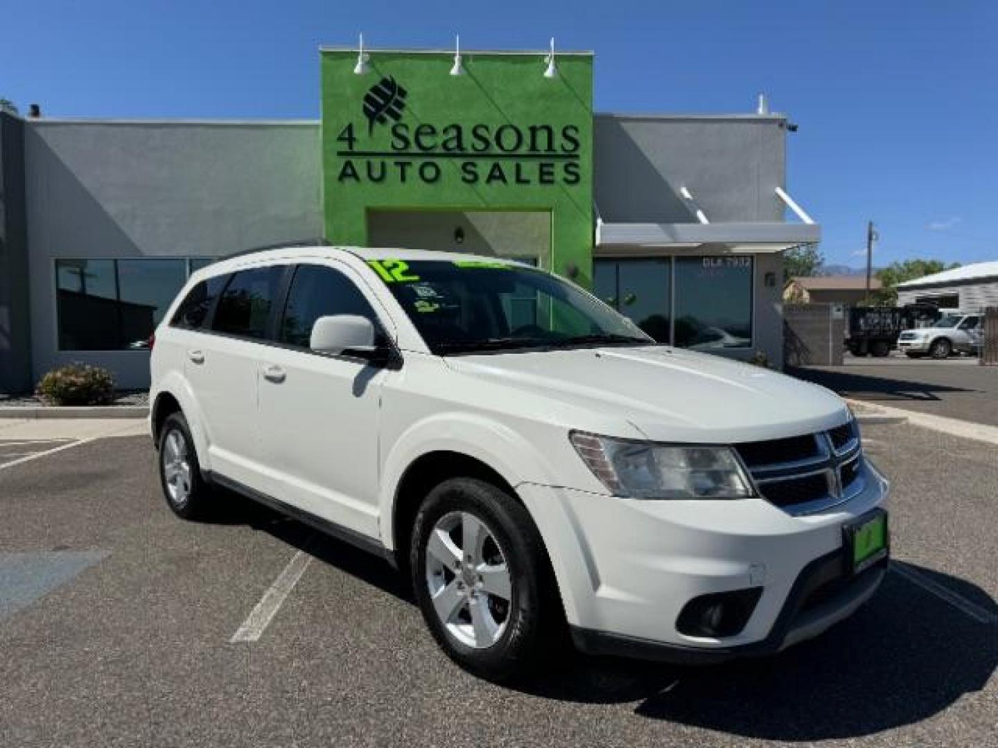 2012 White /Black Cloth Interior Dodge Journey SXT (3C4PDCBG9CT) with an 3.6L V6 DOHC 24V engine, 6-Speed Automatic transmission, located at 940 North Main Street, Cedar City, UT, 84720, (435) 628-0023, 37.692936, -113.061897 - Photo#0