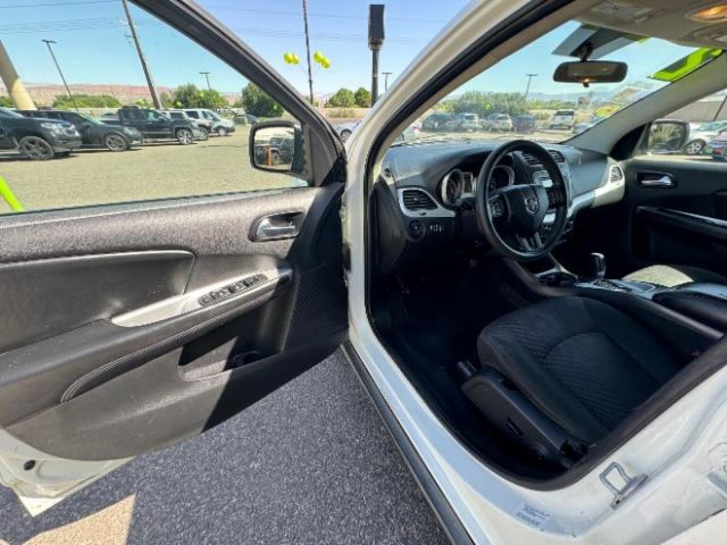 2012 White /Black Cloth Interior Dodge Journey SXT (3C4PDCBG9CT) with an 3.6L V6 DOHC 24V engine, 6-Speed Automatic transmission, located at 940 North Main Street, Cedar City, UT, 84720, (435) 628-0023, 37.692936, -113.061897 - Photo#16