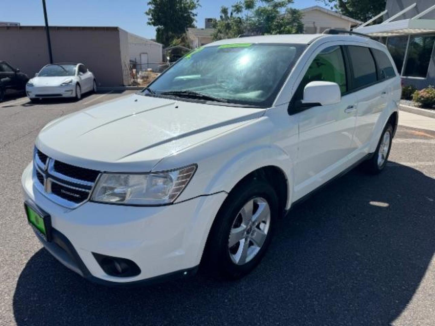 2012 White /Black Cloth Interior Dodge Journey SXT (3C4PDCBG9CT) with an 3.6L V6 DOHC 24V engine, 6-Speed Automatic transmission, located at 940 North Main Street, Cedar City, UT, 84720, (435) 628-0023, 37.692936, -113.061897 - Photo#3