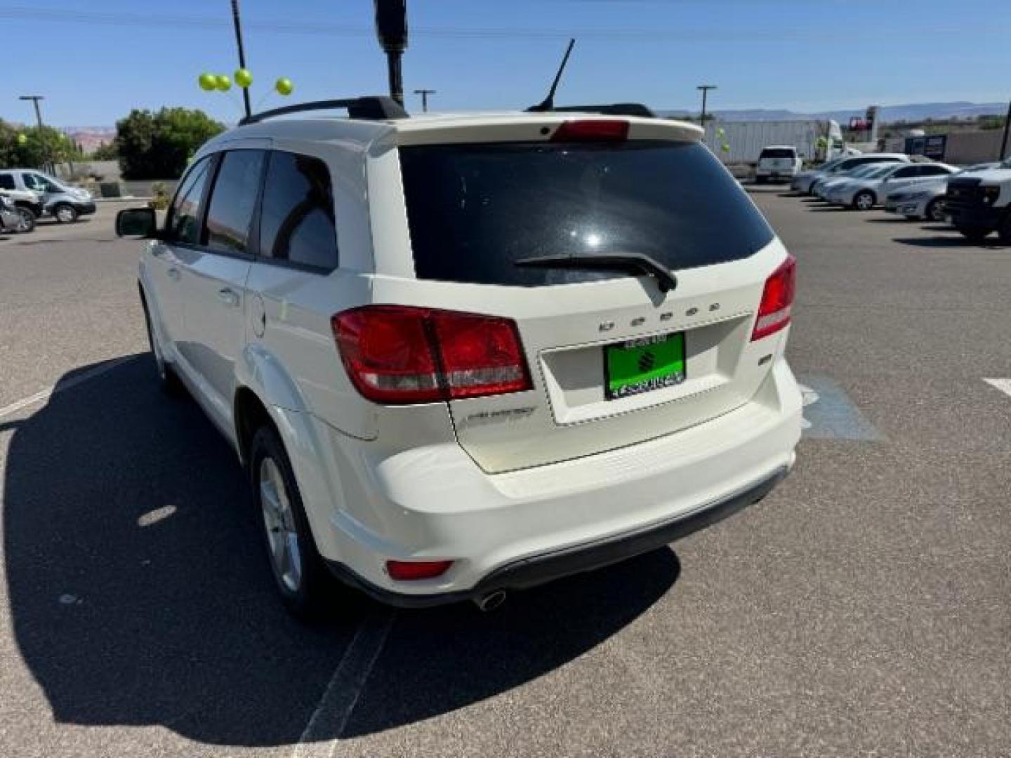 2012 White /Black Cloth Interior Dodge Journey SXT (3C4PDCBG9CT) with an 3.6L V6 DOHC 24V engine, 6-Speed Automatic transmission, located at 940 North Main Street, Cedar City, UT, 84720, (435) 628-0023, 37.692936, -113.061897 - Photo#7