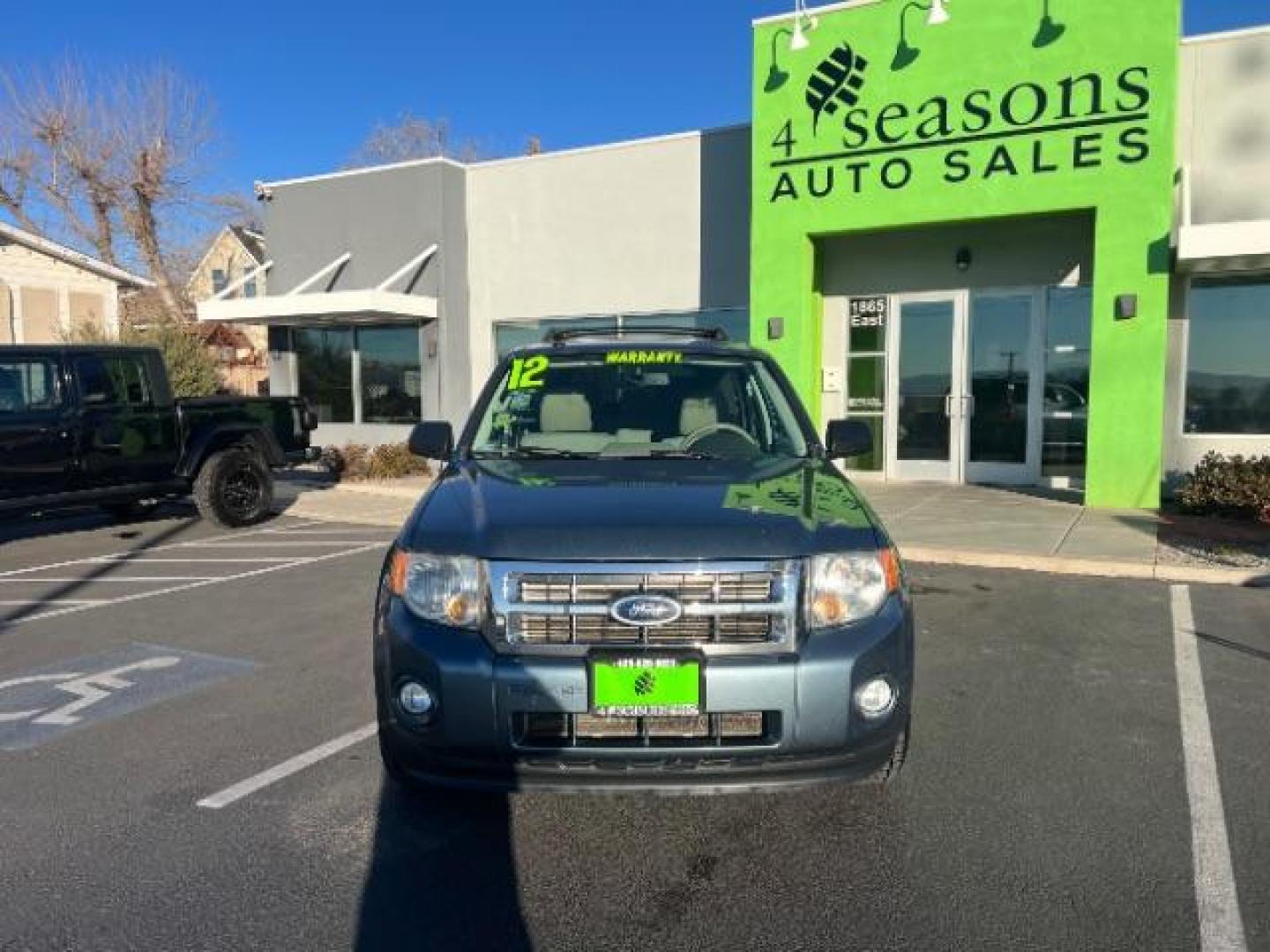 2012 Steel Blue Metallic /Camel Cloth Interior Ford Escape XLT FWD (1FMCU0DG8CK) with an 3.0L V6 DOHC 24V engine, 6-Speed Automatic transmission, located at 940 North Main Street, Cedar City, UT, 84720, (435) 628-0023, 37.692936, -113.061897 - Photo#1