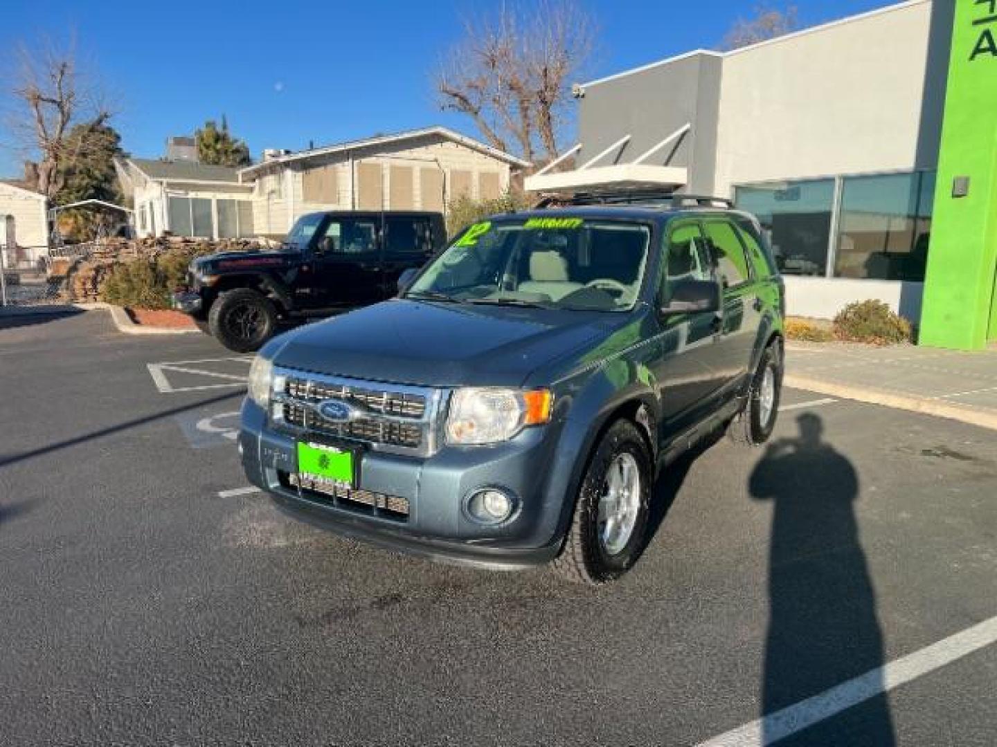 2012 Steel Blue Metallic /Camel Cloth Interior Ford Escape XLT FWD (1FMCU0DG8CK) with an 3.0L V6 DOHC 24V engine, 6-Speed Automatic transmission, located at 940 North Main Street, Cedar City, UT, 84720, (435) 628-0023, 37.692936, -113.061897 - Photo#2