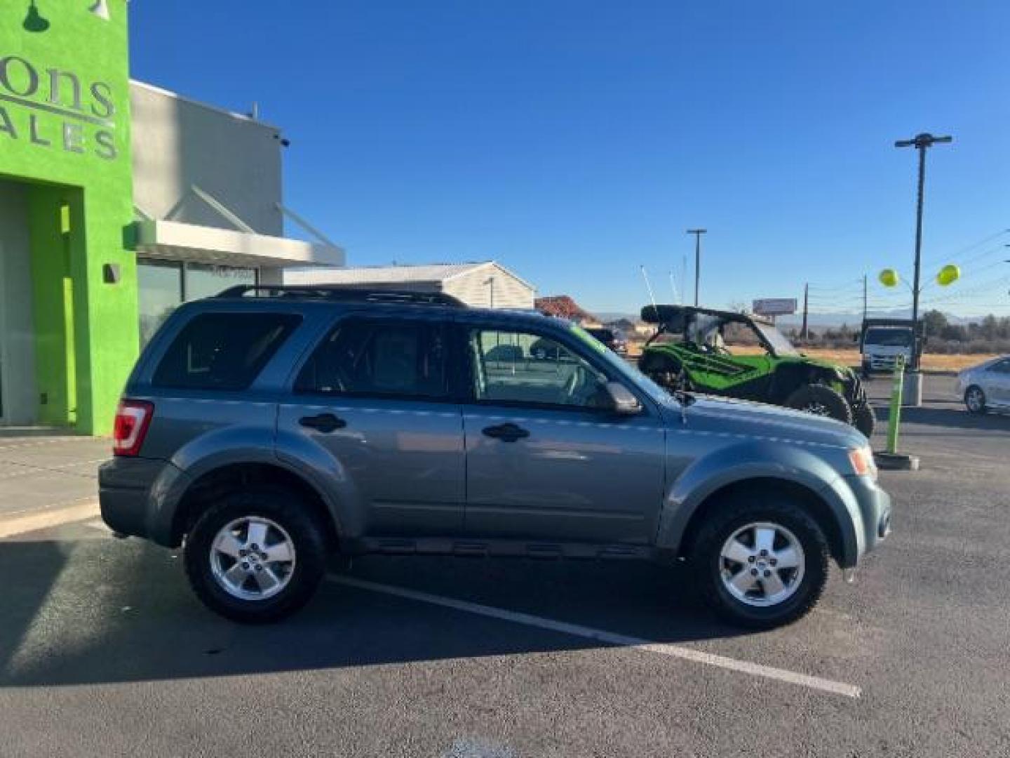 2012 Steel Blue Metallic /Camel Cloth Interior Ford Escape XLT FWD (1FMCU0DG8CK) with an 3.0L V6 DOHC 24V engine, 6-Speed Automatic transmission, located at 940 North Main Street, Cedar City, UT, 84720, (435) 628-0023, 37.692936, -113.061897 - Photo#7