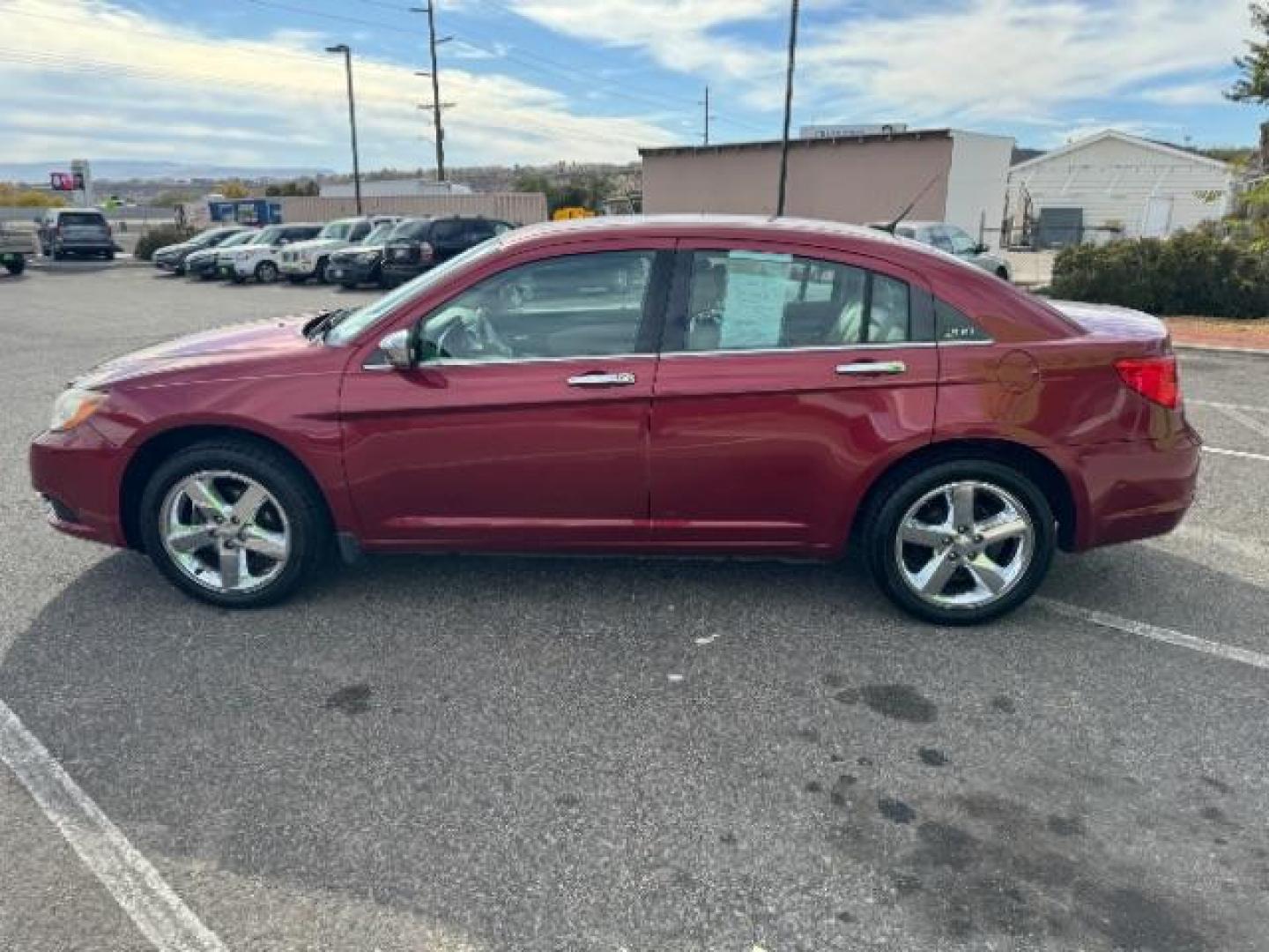 2011 Deep Cherry Red Crystal Pearl /Black Leather Interior Chrysler 200 Limited (1C3BC2FG2BN) with an 3.6L V6 DOHC 24V FFV engine, 6-Speed Automatic transmission, located at 940 North Main Street, Cedar City, UT, 84720, (435) 628-0023, 37.692936, -113.061897 - Photo#5