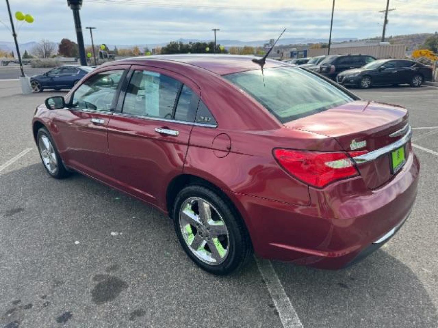 2011 Deep Cherry Red Crystal Pearl /Black Leather Interior Chrysler 200 Limited (1C3BC2FG2BN) with an 3.6L V6 DOHC 24V FFV engine, 6-Speed Automatic transmission, located at 940 North Main Street, Cedar City, UT, 84720, (435) 628-0023, 37.692936, -113.061897 - Photo#6