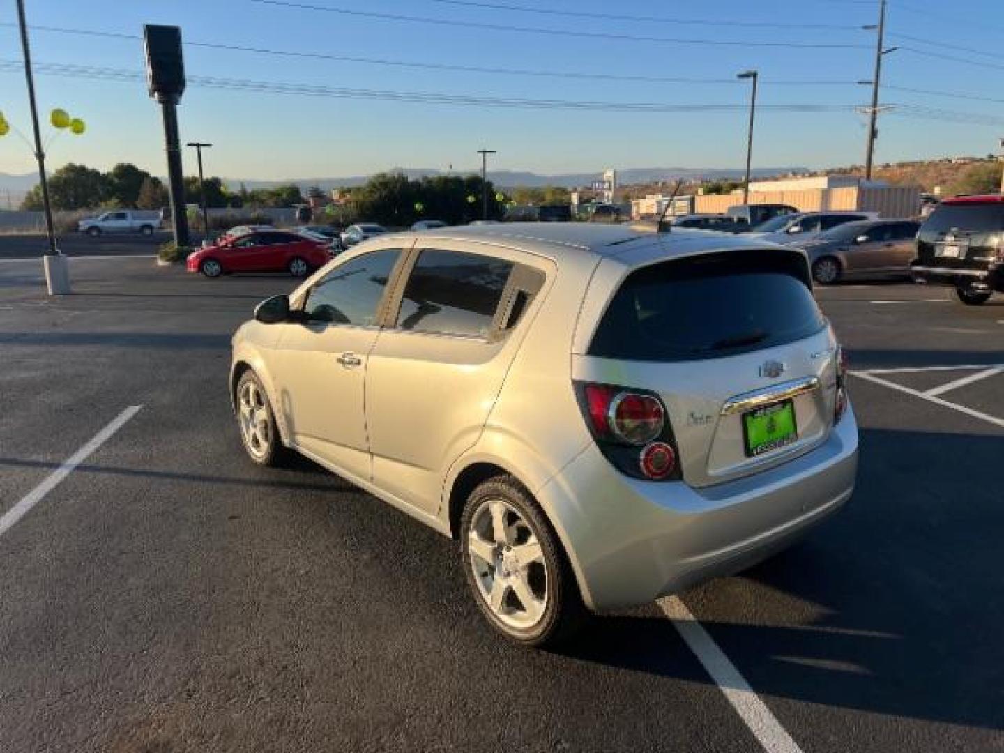 2015 Silver Ice Metallic /Dark Pewter/Dark Tit Chevrolet Sonic LTZ Auto 5-Door (1G1JE6SB0F4) with an 1.4L L4 DOHC 24V TUR engine, 6-Speed Automatic transmission, located at 1865 East Red Hills Pkwy, St. George, 84770, (435) 628-0023, 37.120850, -113.543640 - We specialize in helping ALL people get the best financing available. No matter your credit score, good, bad or none we can get you an amazing rate. Had a bankruptcy, divorce, or repossessions? We give you the green light to get your credit back on the road. Low down and affordable payments that fit - Photo#4