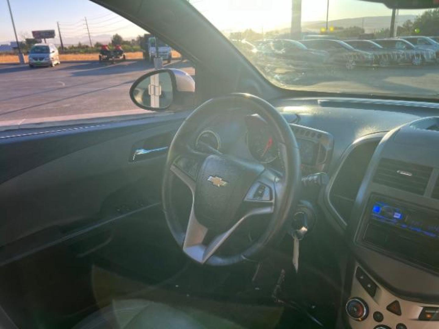 2015 Silver Ice Metallic /Dark Pewter/Dark Tit Chevrolet Sonic LTZ Auto 5-Door (1G1JE6SB0F4) with an 1.4L L4 DOHC 24V TUR engine, 6-Speed Automatic transmission, located at 1865 East Red Hills Pkwy, St. George, 84770, (435) 628-0023, 37.120850, -113.543640 - We specialize in helping ALL people get the best financing available. No matter your credit score, good, bad or none we can get you an amazing rate. Had a bankruptcy, divorce, or repossessions? We give you the green light to get your credit back on the road. Low down and affordable payments that fit - Photo#31