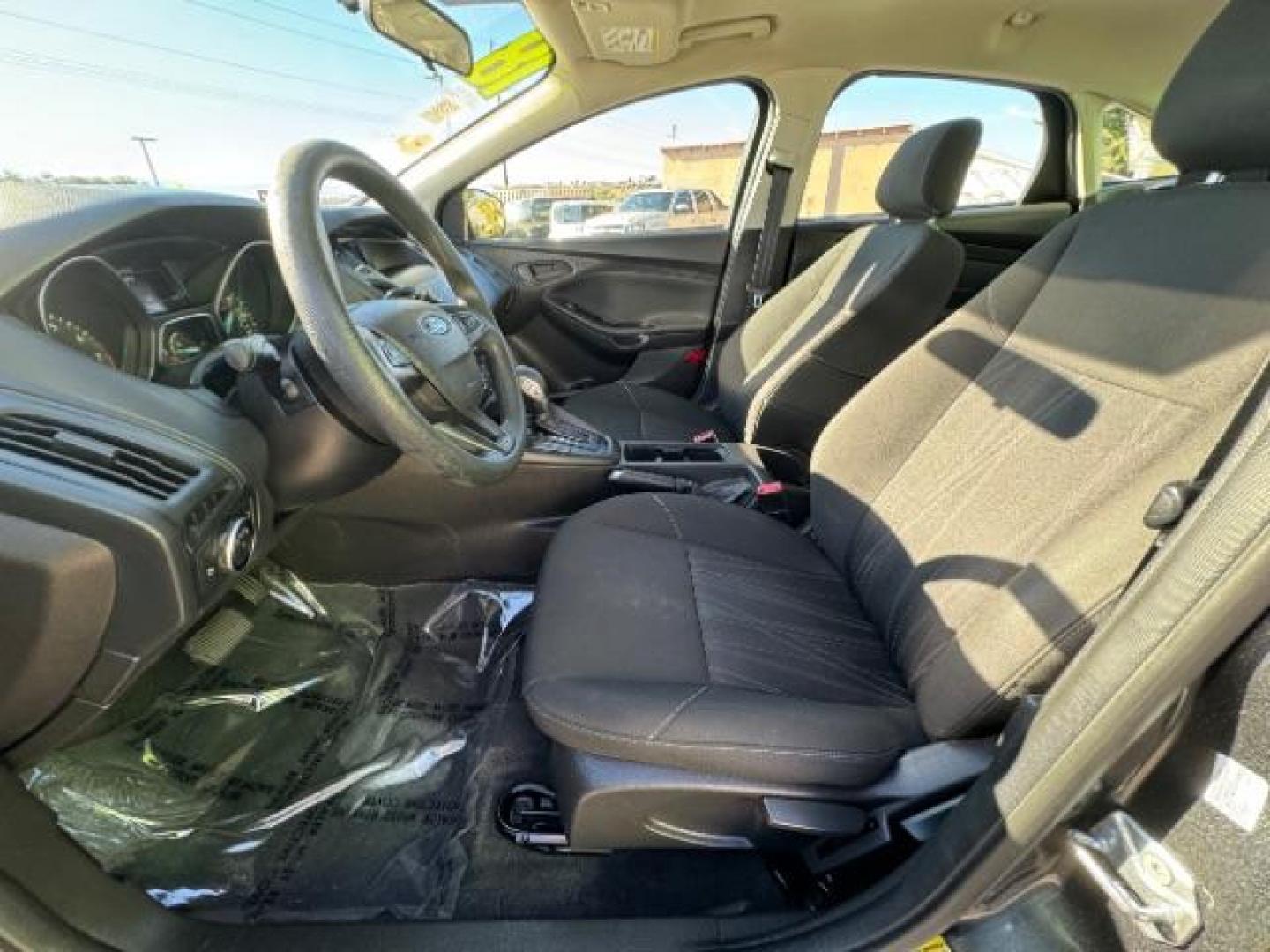 2018 Magnetic Metallic /Charcoal Black Insert w/Warm Steel Surround, cloth Ford Focus S Sedan (1FADP3E24JL) with an 2.0L L4 DOHC 16V engine, 5-Speed Manual transmission, located at 1865 East Red Hills Pkwy, St. George, 84770, (435) 628-0023, 37.120850, -113.543640 - We specialize in helping ALL people get the best financing available. No matter your credit score, good, bad or none we can get you an amazing rate. Had a bankruptcy, divorce, or repossessions? We give you the green light to get your credit back on the road. Low down and affordable payments that fit - Photo#16