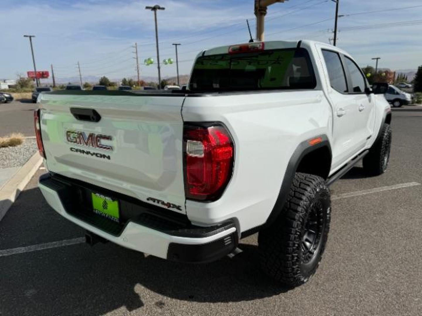 2023 Summit White /Obsidian Rush GMC Canyon AT4X Crew Cab 4WD (1GTP6EEK4P1) with an 2.7L L4 DOHC 16V engine, 6-Speed Automatic transmission, located at 1865 East Red Hills Pkwy, St. George, 84770, (435) 628-0023, 37.120850, -113.543640 - Near new, 1 owner, clear bra, tint, sunroof. Rear truck in mint condition - Photo#9