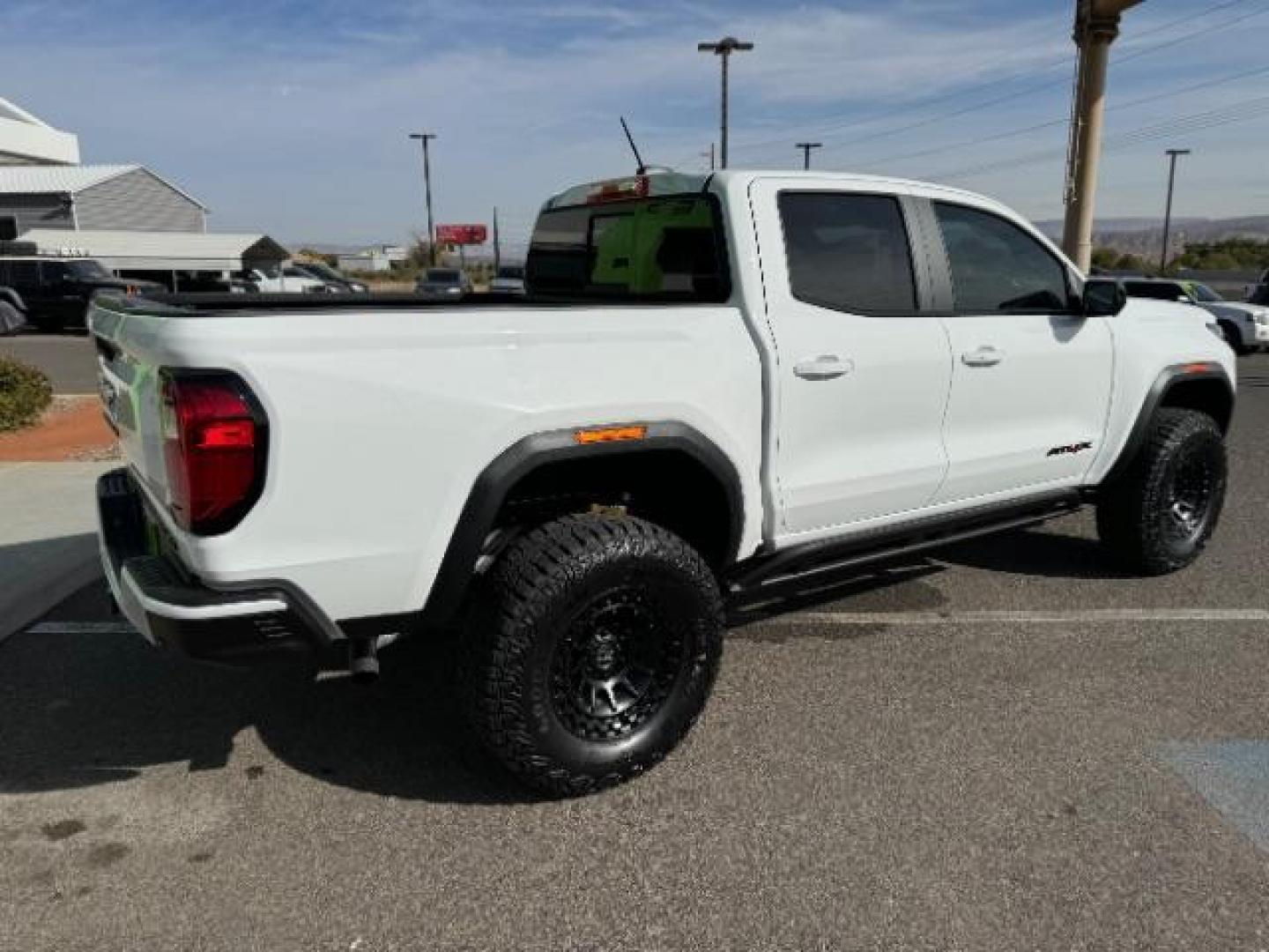 2023 Summit White /Obsidian Rush GMC Canyon AT4X Crew Cab 4WD (1GTP6EEK4P1) with an 2.7L L4 DOHC 16V engine, 6-Speed Automatic transmission, located at 1865 East Red Hills Pkwy, St. George, 84770, (435) 628-0023, 37.120850, -113.543640 - Near new, 1 owner, clear bra, tint, sunroof. Rear truck in mint condition - Photo#10