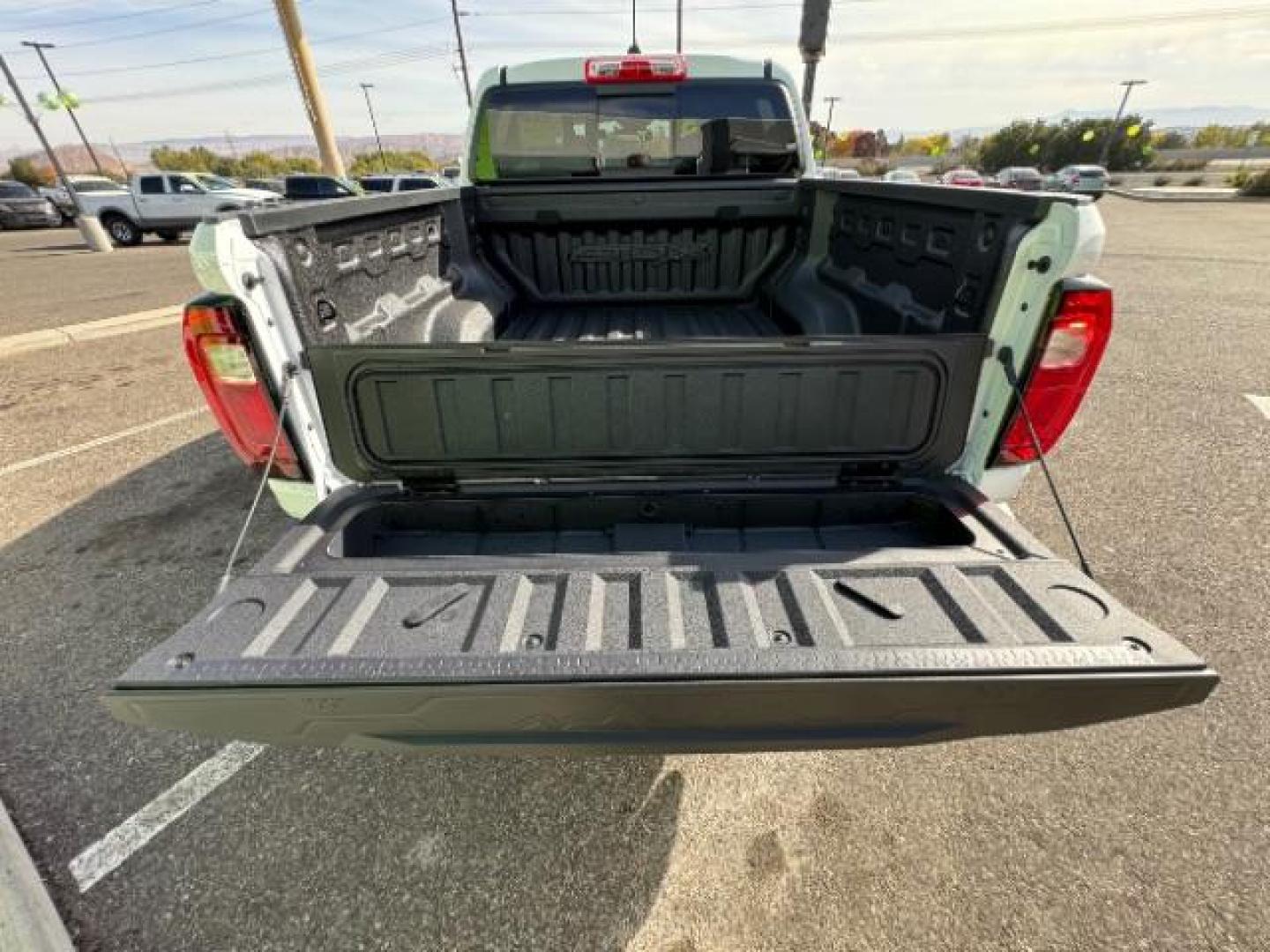 2023 Summit White /Obsidian Rush GMC Canyon AT4X Crew Cab 4WD (1GTP6EEK4P1) with an 2.7L L4 DOHC 16V engine, 6-Speed Automatic transmission, located at 1865 East Red Hills Pkwy, St. George, 84770, (435) 628-0023, 37.120850, -113.543640 - Near new, 1 owner, clear bra, tint, sunroof. Rear truck in mint condition - Photo#16