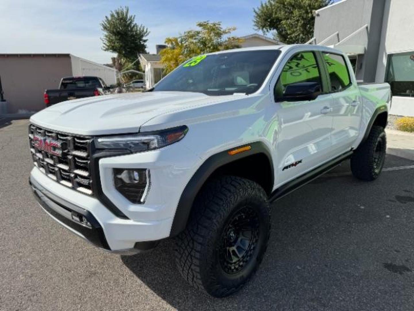 2023 Summit White /Obsidian Rush GMC Canyon AT4X Crew Cab 4WD (1GTP6EEK4P1) with an 2.7L L4 DOHC 16V engine, 6-Speed Automatic transmission, located at 1865 East Red Hills Pkwy, St. George, 84770, (435) 628-0023, 37.120850, -113.543640 - Near new, 1 owner, clear bra, tint, sunroof. Rear truck in mint condition - Photo#3