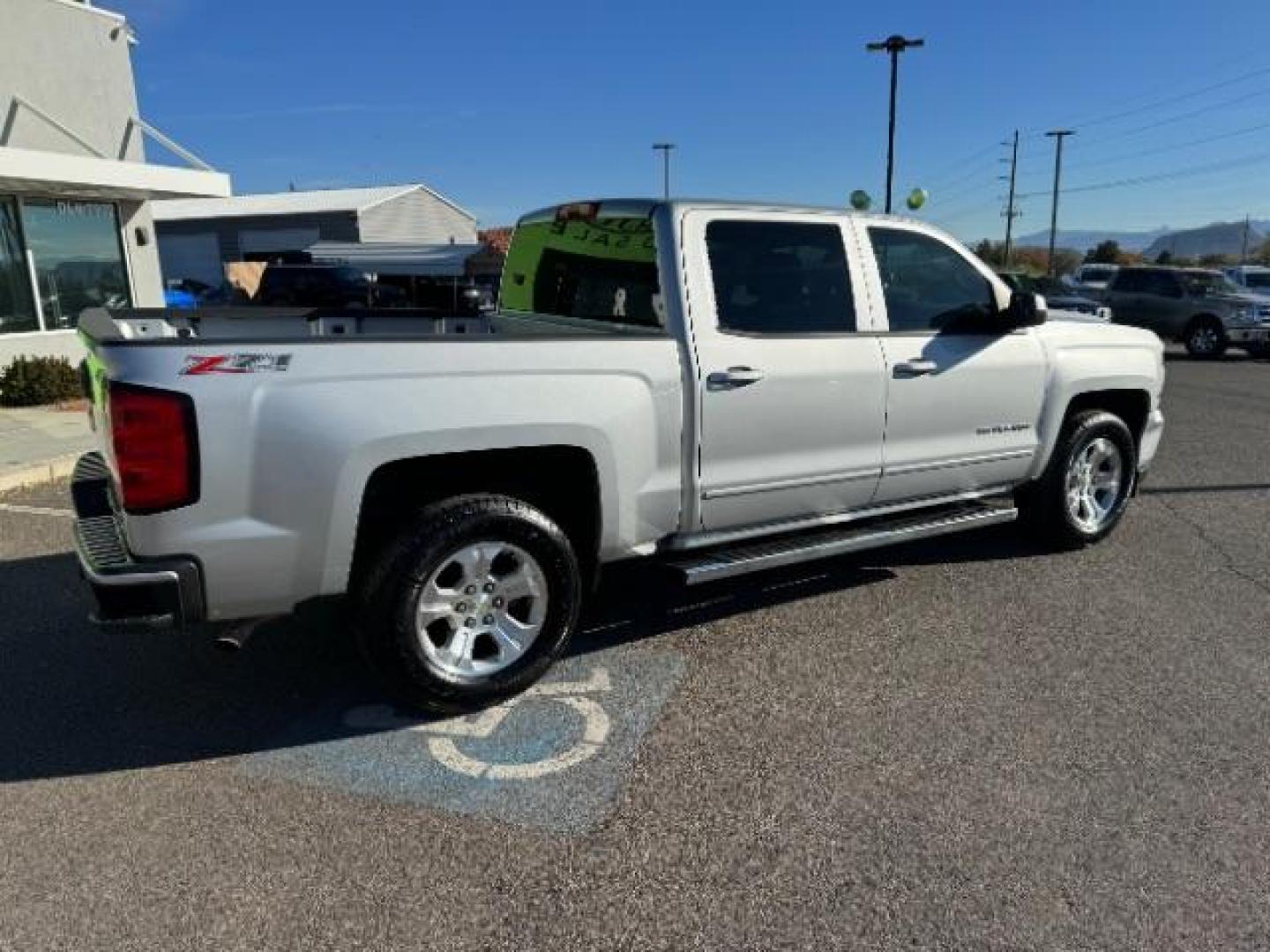 2016 Silver Ice Metallic /Dark Ash Seats w/Jet Black Interior Accents, cloth Chevrolet Silverado 1500 LT Crew Cab 4WD (3GCUKREC5GG) with an 5.3L V8 OHV 16V engine, 6-Speed Automatic transmission, located at 1865 East Red Hills Pkwy, St. George, 84770, (435) 628-0023, 37.120850, -113.543640 - We specialize in helping ALL people get the best financing available. No matter your credit score, good, bad or none we can get you an amazing rate. Had a bankruptcy, divorce, or repossessions? We give you the green light to get your credit back on the road. Low down and affordable payments that fit - Photo#10