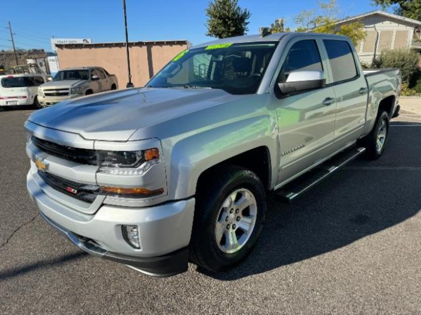 2016 Silver Ice Metallic /Dark Ash Seats w/Jet Black Interior Accents, cloth Chevrolet Silverado 1500 LT Crew Cab 4WD (3GCUKREC5GG) with an 5.3L V8 OHV 16V engine, 6-Speed Automatic transmission, located at 1865 East Red Hills Pkwy, St. George, 84770, (435) 628-0023, 37.120850, -113.543640 - Photo#3