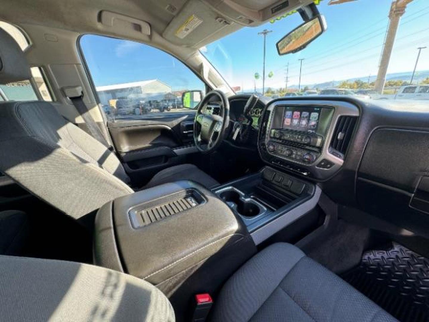 2016 Silver Ice Metallic /Dark Ash Seats w/Jet Black Interior Accents, cloth Chevrolet Silverado 1500 LT Crew Cab 4WD (3GCUKREC5GG) with an 5.3L V8 OHV 16V engine, 6-Speed Automatic transmission, located at 1865 East Red Hills Pkwy, St. George, 84770, (435) 628-0023, 37.120850, -113.543640 - Photo#39