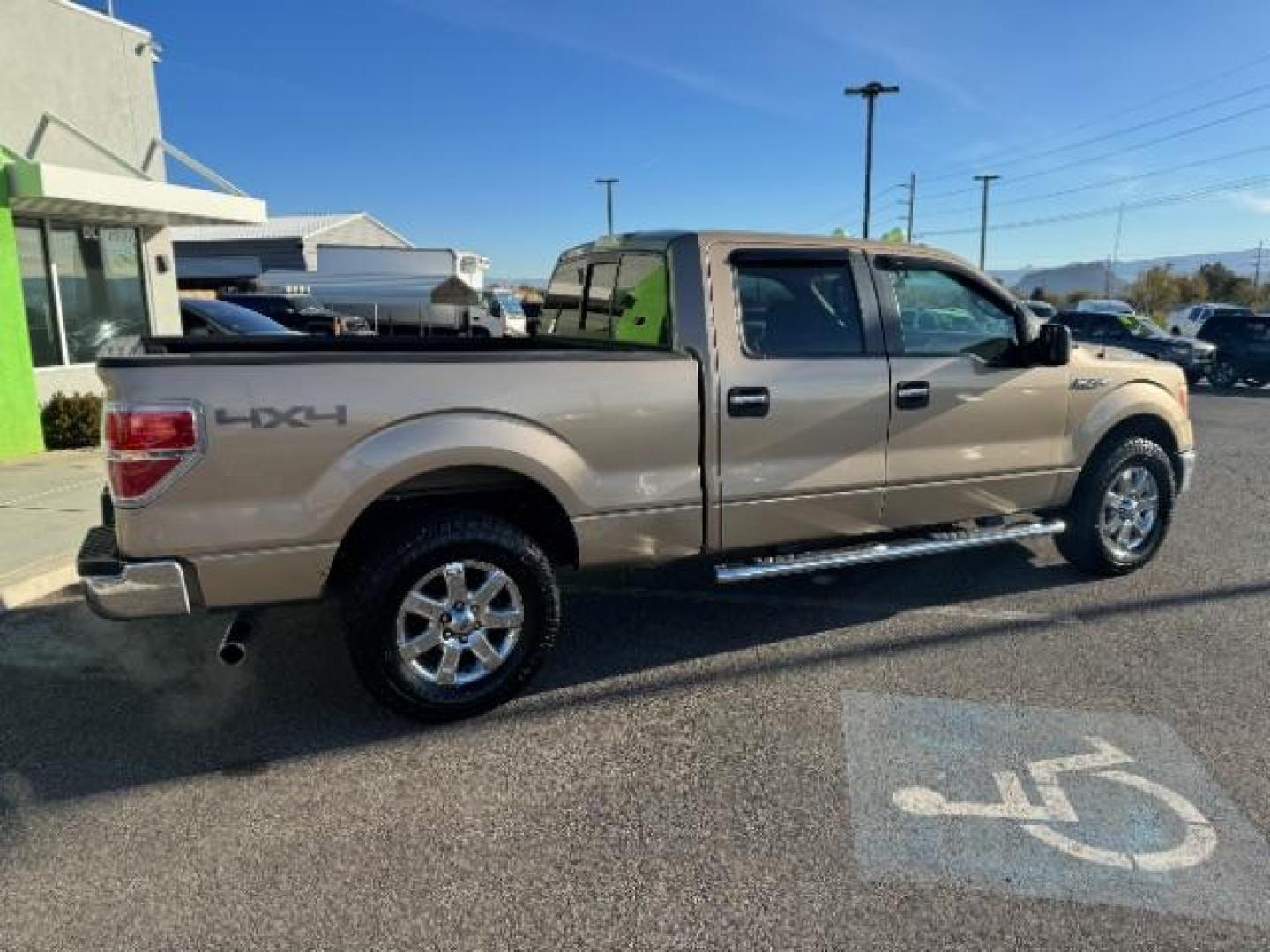 2013 Tan /Tan Cloth Interior Ford F-150 XLT SuperCrew 6.5-ft. Bed 4WD (1FTFW1EF9DK) with an 5.0L V8 engine, 6-Speed Automatic transmission, located at 1865 East Red Hills Pkwy, St. George, 84770, (435) 628-0023, 37.120850, -113.543640 - Photo#10