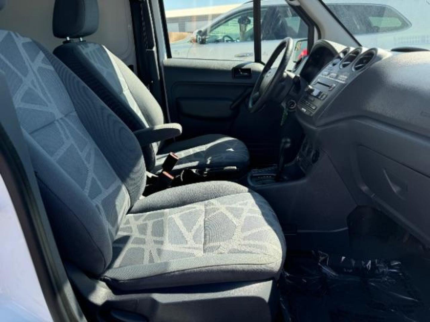 2013 Frozen White /Dark Gray Ford Transit Connect XLT with Side and Re (NM0LS7DN8DT) with an 2.0L L4 DOHC 16V engine, 4-Speed Automatic transmission, located at 1865 East Red Hills Pkwy, St. George, 84770, (435) 628-0023, 37.120850, -113.543640 - We specialize in helping ALL people get the best financing available. No matter your credit score, good, bad or none we can get you an amazing rate. Had a bankruptcy, divorce, or repossessions? We give you the green light to get your credit back on the road. Low down and affordable payments that fit - Photo#28