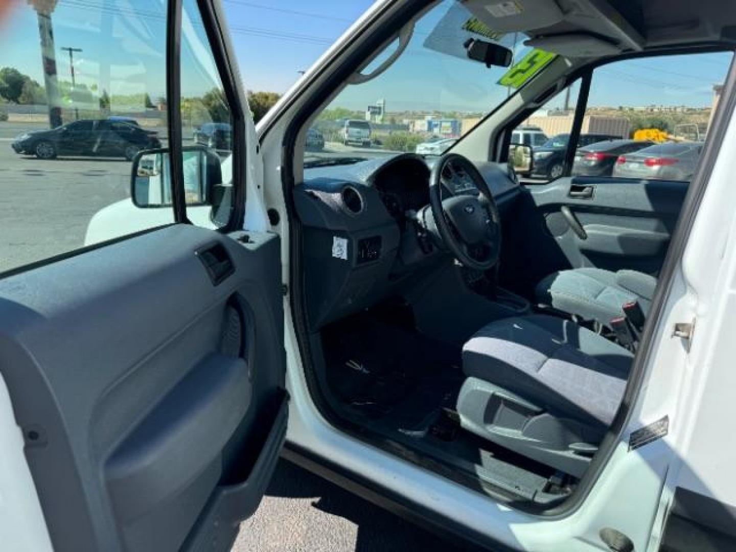 2013 Frozen White /Dark Gray Ford Transit Connect XLT with Side and Re (NM0LS7DN8DT) with an 2.0L L4 DOHC 16V engine, 4-Speed Automatic transmission, located at 940 North Main Street, Cedar City, UT, 84720, (435) 628-0023, 37.692936, -113.061897 - We specialize in helping ALL people get the best financing available. No matter your credit score, good, bad or none we can get you an amazing rate. Had a bankruptcy, divorce, or repossessions? We give you the green light to get your credit back on the road. Low down and affordable payments that fit - Photo#12