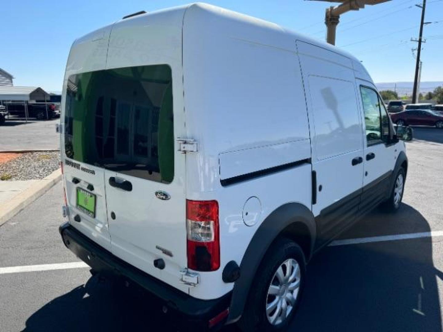 2013 Frozen White /Dark Gray Ford Transit Connect XLT with Side and Re (NM0LS7DN8DT) with an 2.0L L4 DOHC 16V engine, 4-Speed Automatic transmission, located at 1865 East Red Hills Pkwy, St. George, 84770, (435) 628-0023, 37.120850, -113.543640 - We specialize in helping ALL people get the best financing available. No matter your credit score, good, bad or none we can get you an amazing rate. Had a bankruptcy, divorce, or repossessions? We give you the green light to get your credit back on the road. Low down and affordable payments that fit - Photo#6