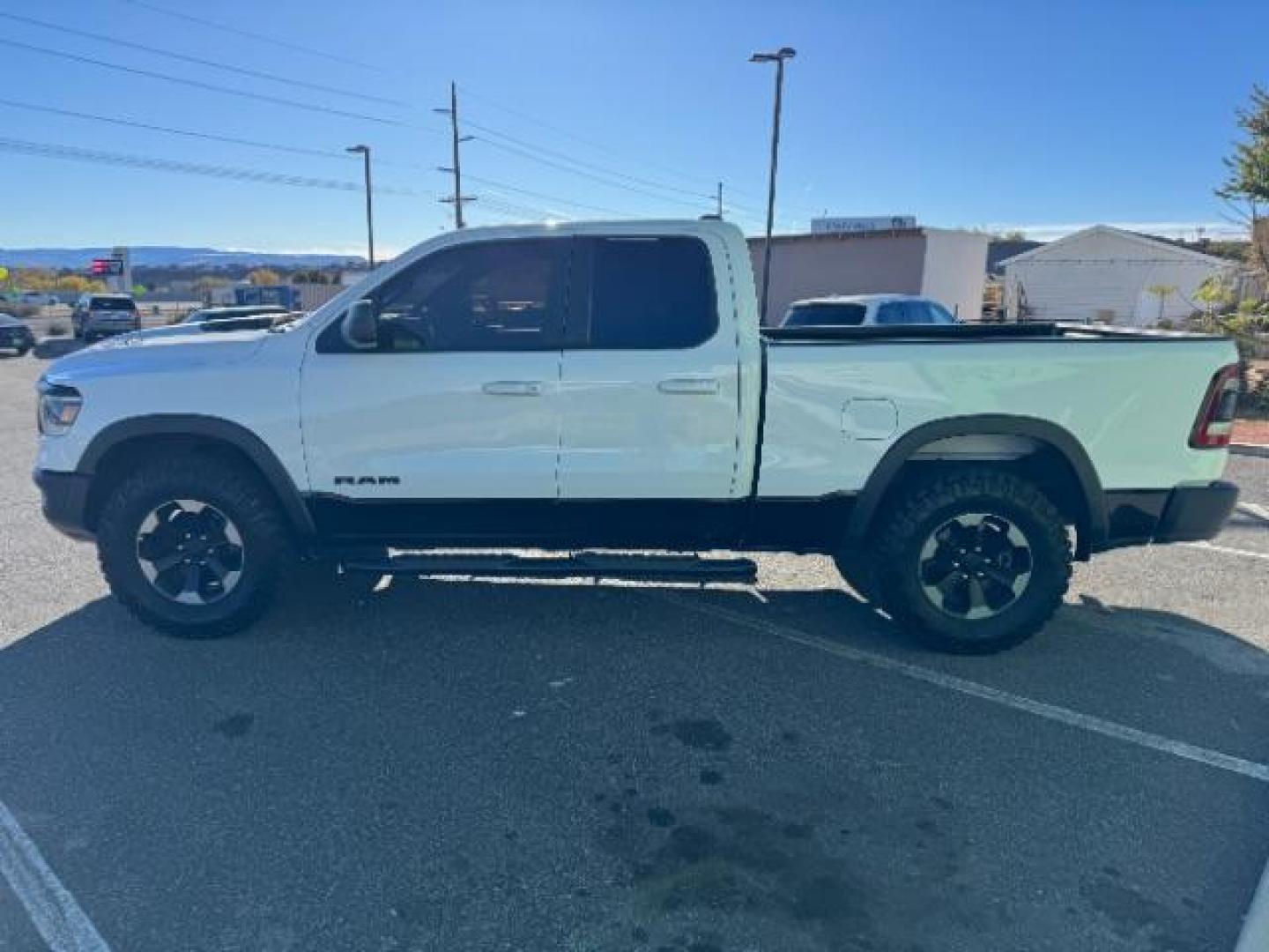 2019 White /Black RAM 1500 Rebel Quad Cab 4WD (1C6RRFEG5KN) with an 3.6L V6 DOHC 24V engine, 8-Speed Automatic transmission, located at 1865 East Red Hills Pkwy, St. George, 84770, (435) 628-0023, 37.120850, -113.543640 - Photo#4