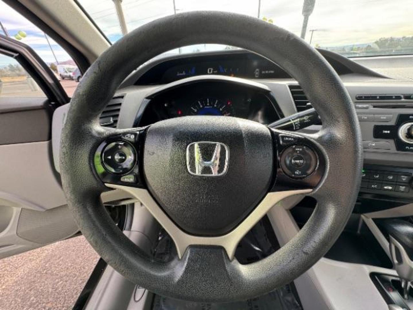 2012 Crystal Black Pearl /Beige Cloth Interior Honda Civic LX Sedan 5-Speed AT (2HGFB2F57CH) with an 1.8L L4 SOHC 16V engine, 5-Speed Automatic transmission, located at 940 North Main Street, Cedar City, UT, 84720, (435) 628-0023, 37.692936, -113.061897 - Photo#20