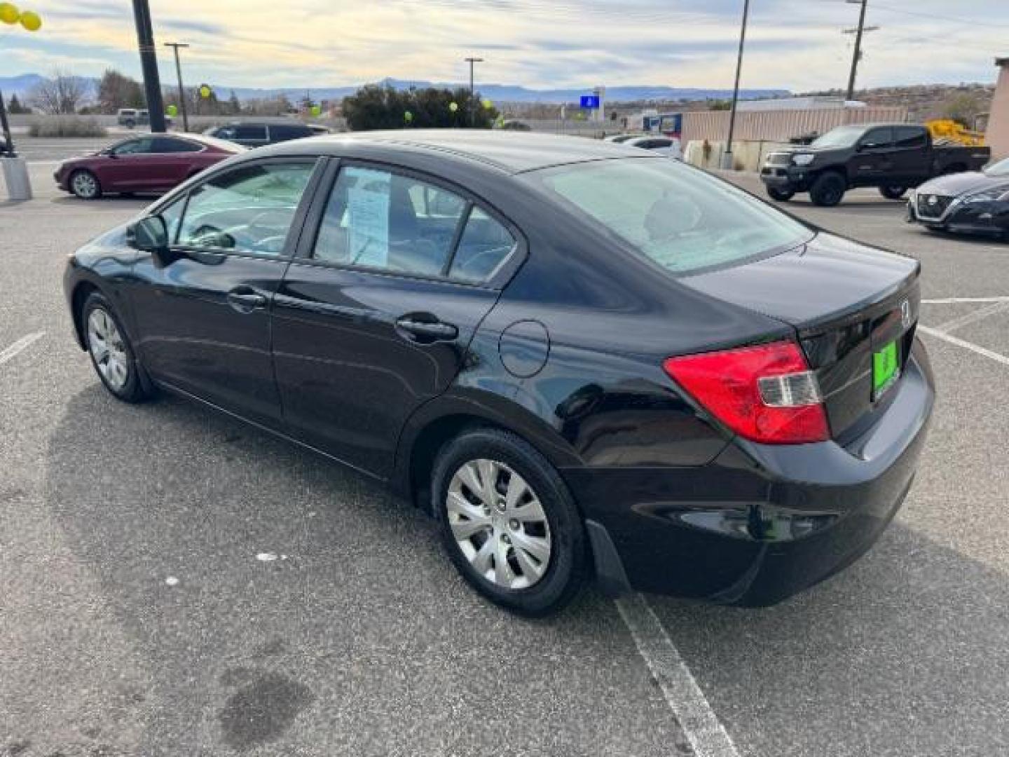 2012 Crystal Black Pearl /Beige Cloth Interior Honda Civic LX Sedan 5-Speed AT (2HGFB2F57CH) with an 1.8L L4 SOHC 16V engine, 5-Speed Automatic transmission, located at 940 North Main Street, Cedar City, UT, 84720, (435) 628-0023, 37.692936, -113.061897 - Photo#6