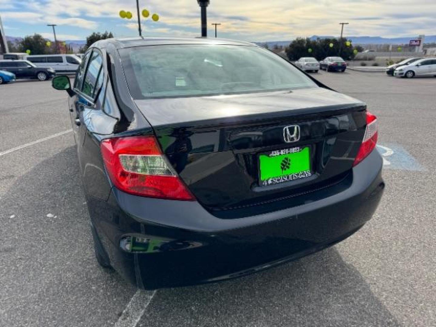 2012 Crystal Black Pearl /Beige Cloth Interior Honda Civic LX Sedan 5-Speed AT (2HGFB2F57CH) with an 1.8L L4 SOHC 16V engine, 5-Speed Automatic transmission, located at 940 North Main Street, Cedar City, UT, 84720, (435) 628-0023, 37.692936, -113.061897 - Photo#7