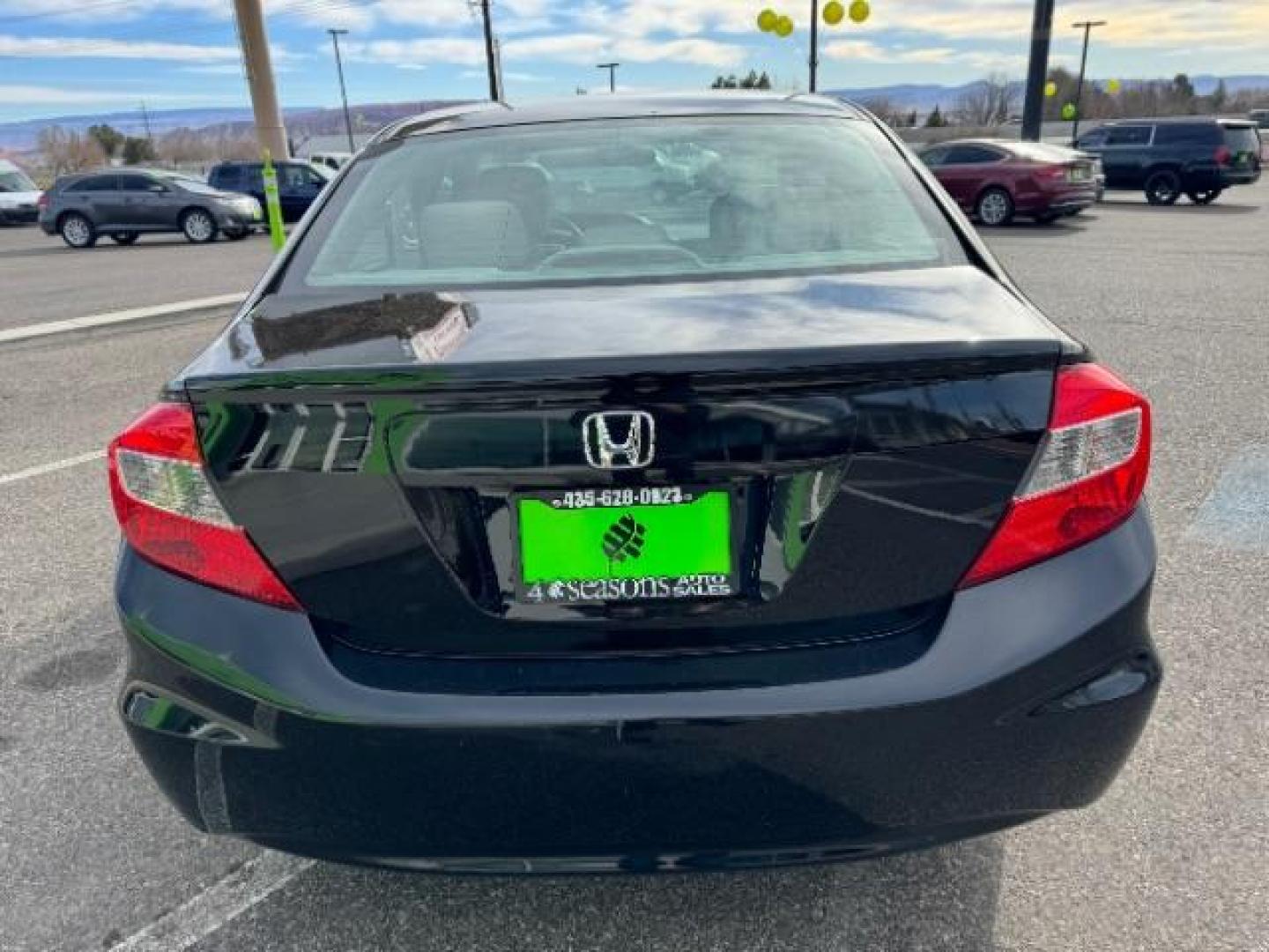 2012 Crystal Black Pearl /Beige Cloth Interior Honda Civic LX Sedan 5-Speed AT (2HGFB2F57CH) with an 1.8L L4 SOHC 16V engine, 5-Speed Automatic transmission, located at 940 North Main Street, Cedar City, UT, 84720, (435) 628-0023, 37.692936, -113.061897 - Photo#8