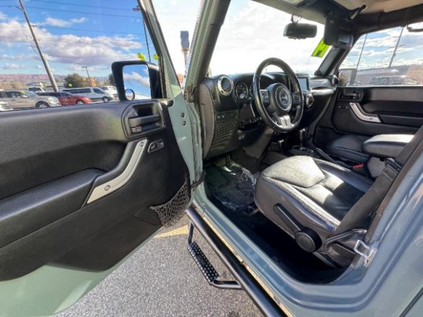 2014 Gray /Black Jeep Wrangler Unlimited Rubicon 4WD (1C4BJWFG6EL) with an 3.6L V6 DOHC 24V FFV engine, 5-Speed Automatic transmission, located at 940 North Main Street, Cedar City, UT, 84720, (435) 628-0023, 37.692936, -113.061897 - Photo#17