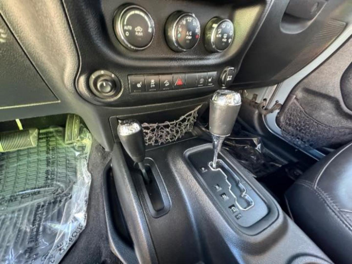 2014 Gray /Black Jeep Wrangler Unlimited Rubicon 4WD (1C4BJWFG6EL) with an 3.6L V6 DOHC 24V FFV engine, 5-Speed Automatic transmission, located at 940 North Main Street, Cedar City, UT, 84720, (435) 628-0023, 37.692936, -113.061897 - Photo#22