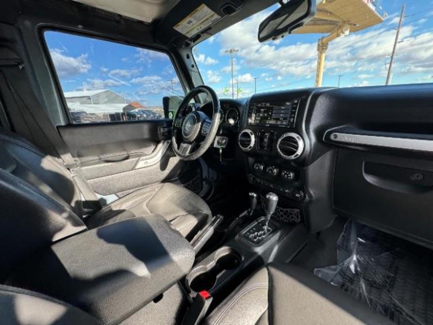 2014 Gray /Black Jeep Wrangler Unlimited Rubicon 4WD (1C4BJWFG6EL) with an 3.6L V6 DOHC 24V FFV engine, 5-Speed Automatic transmission, located at 940 North Main Street, Cedar City, UT, 84720, (435) 628-0023, 37.692936, -113.061897 - Photo#30