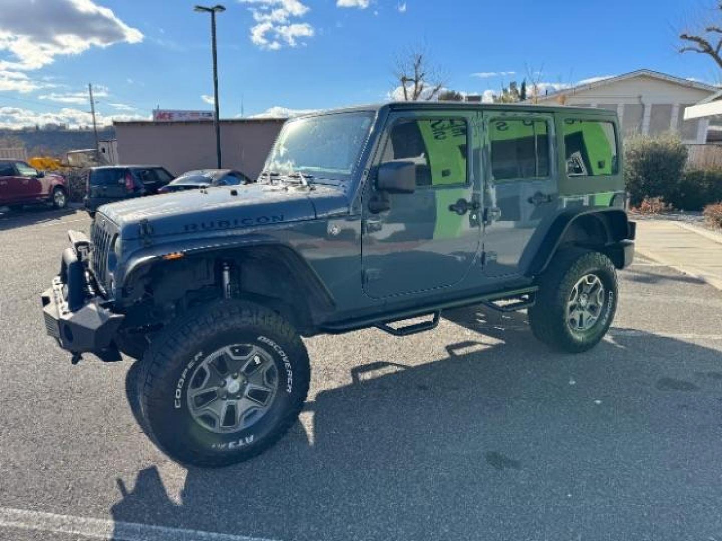 2014 Gray /Black Jeep Wrangler Unlimited Rubicon 4WD (1C4BJWFG6EL) with an 3.6L V6 DOHC 24V FFV engine, 5-Speed Automatic transmission, located at 940 North Main Street, Cedar City, UT, 84720, (435) 628-0023, 37.692936, -113.061897 - Photo#4