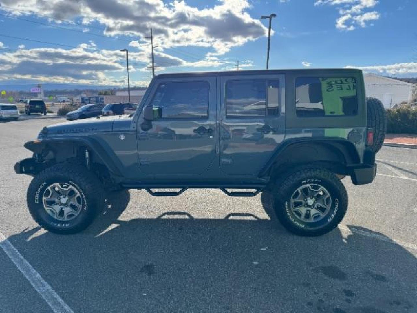 2014 Gray /Black Jeep Wrangler Unlimited Rubicon 4WD (1C4BJWFG6EL) with an 3.6L V6 DOHC 24V FFV engine, 5-Speed Automatic transmission, located at 940 North Main Street, Cedar City, UT, 84720, (435) 628-0023, 37.692936, -113.061897 - Photo#5