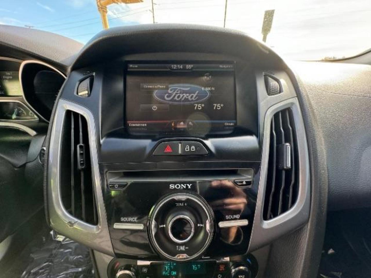 2014 Performance Blue Metallic /Charcoal Black Ford Focus Titanium Sedan (1FADP3J2XEL) with an 2.0L L4 DOHC 16V engine, 6-Speed Automatic transmission, located at 940 North Main Street, Cedar City, UT, 84720, (435) 628-0023, 37.692936, -113.061897 - Photo#23