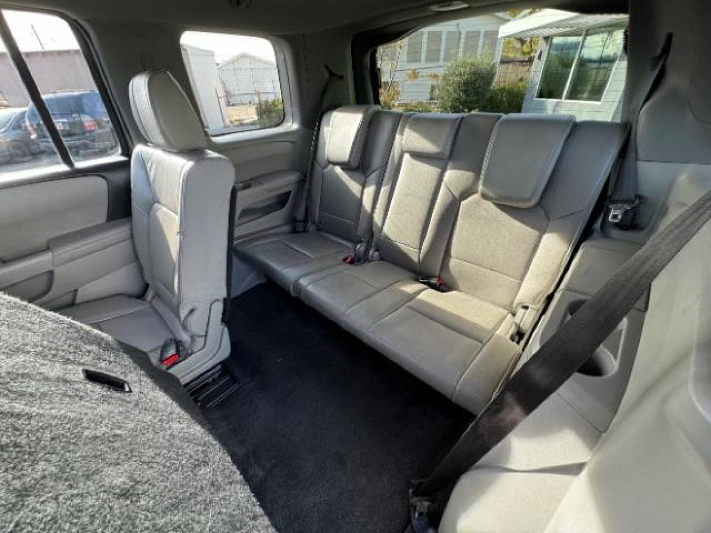 2013 Obsidian Blue Pearl /Gray Leather Interior Honda Pilot EX-L 2WD 5-Spd AT (5FNYF3H56DB) with an 3.5L V6 SOHC 24V engine, 5-Speed Automatic transmission, located at 1865 East Red Hills Pkwy, St. George, 84770, (435) 628-0023, 37.120850, -113.543640 - Photo#32