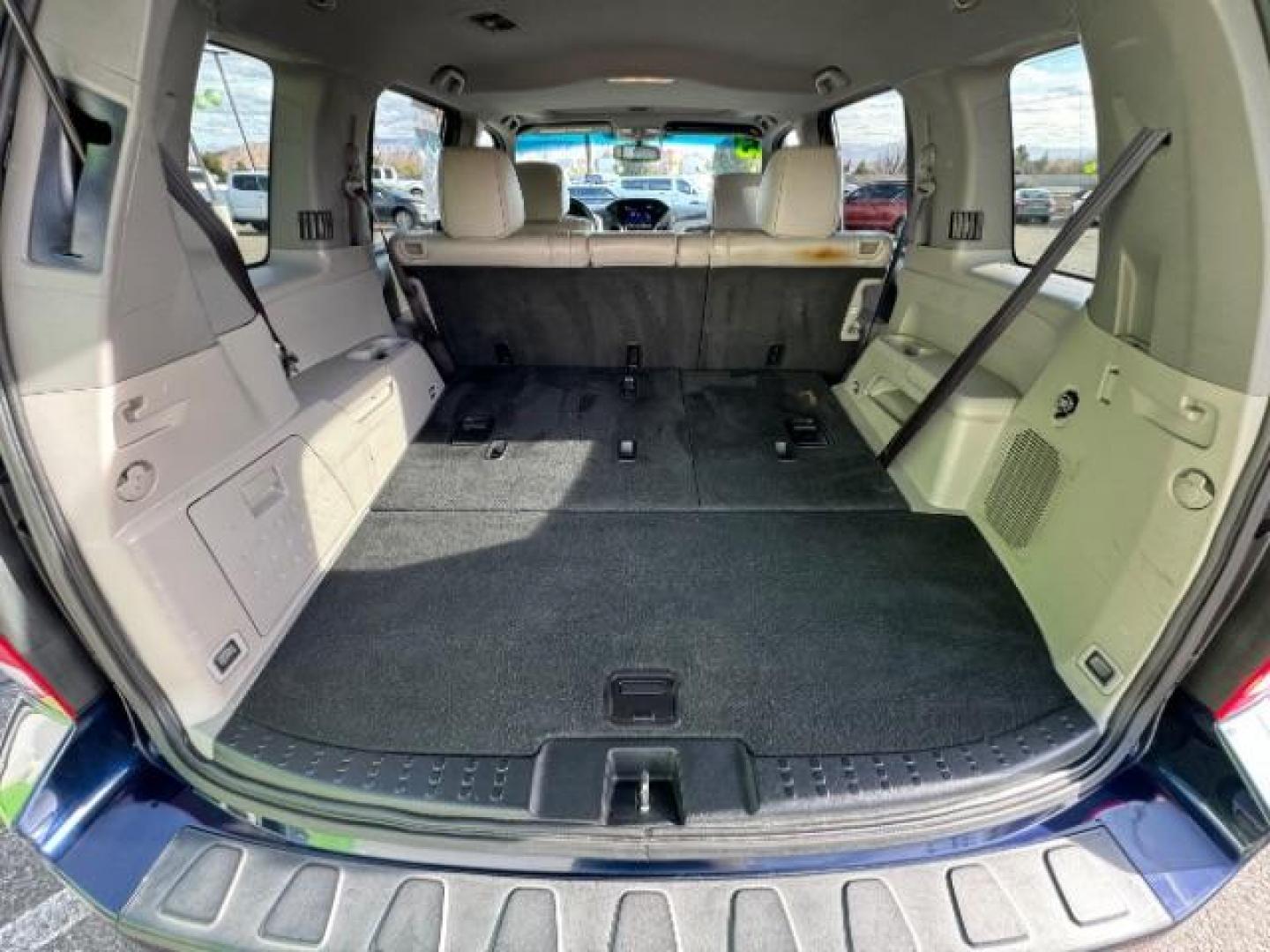 2013 Obsidian Blue Pearl /Gray Leather Interior Honda Pilot EX-L 2WD 5-Spd AT (5FNYF3H56DB) with an 3.5L V6 SOHC 24V engine, 5-Speed Automatic transmission, located at 1865 East Red Hills Pkwy, St. George, 84770, (435) 628-0023, 37.120850, -113.543640 - Photo#35