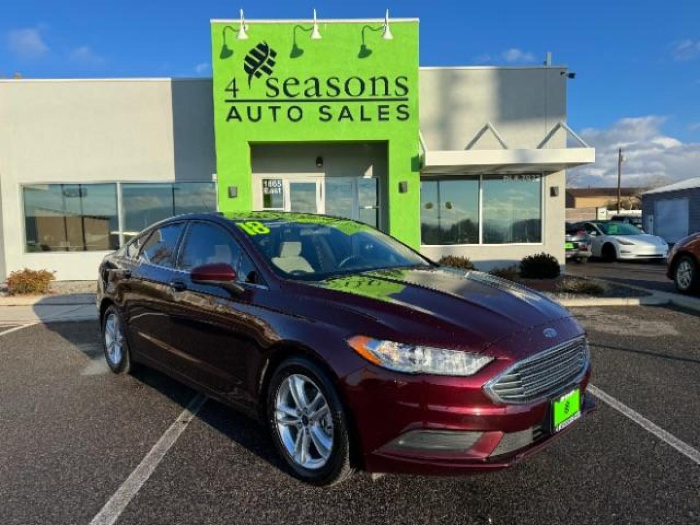 2018 Burgundy Velvet Metallic Tinted Clearcoat /Medium Light Stone, cloth Ford Fusion SE (3FA6P0H75JR) with an 2.5L L4 DOHC 16V engine, 6-Speed Automatic transmission, located at 1865 East Red Hills Pkwy, St. George, 84770, (435) 628-0023, 37.120850, -113.543640 - Photo#0