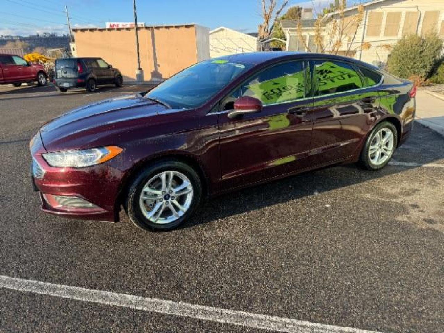 2018 Burgundy Velvet Metallic Tinted Clearcoat /Medium Light Stone, cloth Ford Fusion SE (3FA6P0H75JR) with an 2.5L L4 DOHC 16V engine, 6-Speed Automatic transmission, located at 1865 East Red Hills Pkwy, St. George, 84770, (435) 628-0023, 37.120850, -113.543640 - Photo#4