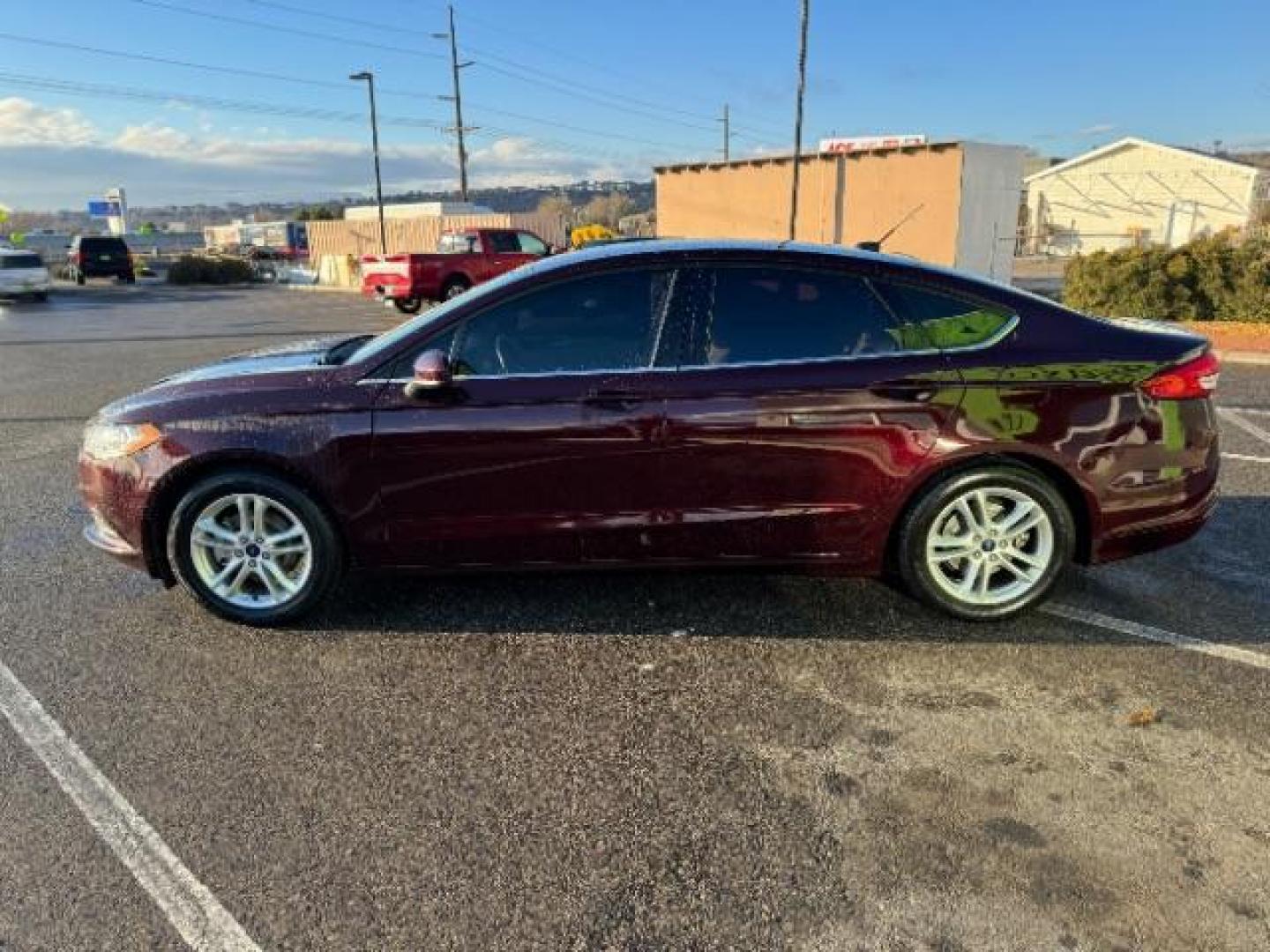 2018 Burgundy Velvet Metallic Tinted Clearcoat /Medium Light Stone, cloth Ford Fusion SE (3FA6P0H75JR) with an 2.5L L4 DOHC 16V engine, 6-Speed Automatic transmission, located at 1865 East Red Hills Pkwy, St. George, 84770, (435) 628-0023, 37.120850, -113.543640 - Photo#5