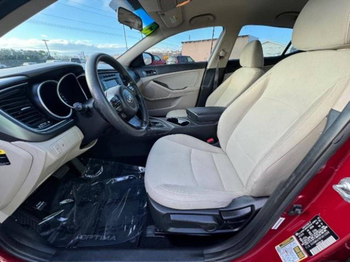 2015 Dark Cherry /Black Kia Optima LX (5XXGM4A78FG) with an 2.4L L4 DOHC 16V engine, 6-Speed Automatic transmission, located at 1865 East Red Hills Pkwy, St. George, 84770, (435) 628-0023, 37.120850, -113.543640 - Photo#18