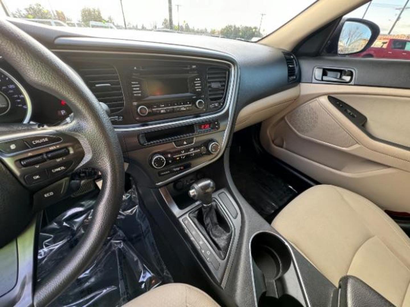 2015 Dark Cherry /Black Kia Optima LX (5XXGM4A78FG) with an 2.4L L4 DOHC 16V engine, 6-Speed Automatic transmission, located at 1865 East Red Hills Pkwy, St. George, 84770, (435) 628-0023, 37.120850, -113.543640 - Photo#19