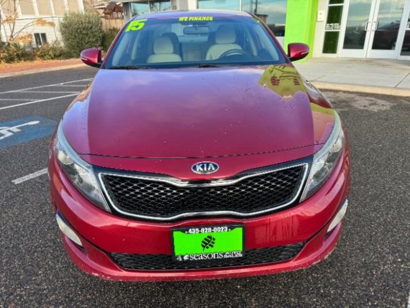 2015 Dark Cherry /Black Kia Optima LX (5XXGM4A78FG) with an 2.4L L4 DOHC 16V engine, 6-Speed Automatic transmission, located at 1865 East Red Hills Pkwy, St. George, 84770, (435) 628-0023, 37.120850, -113.543640 - Photo#2