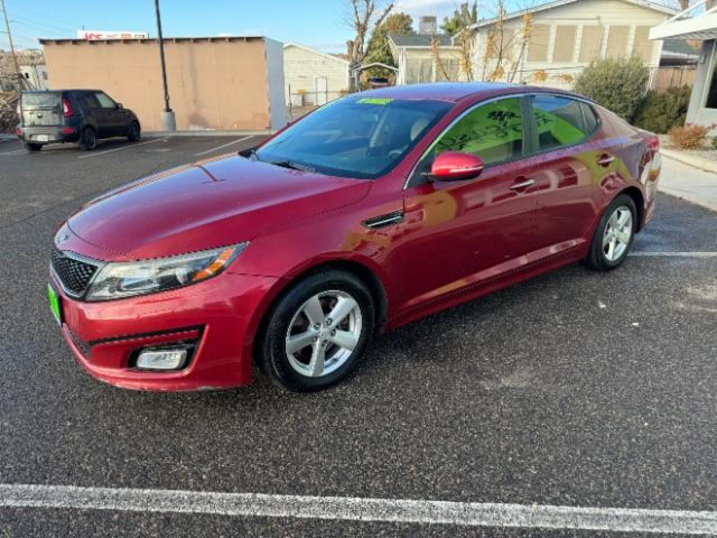 2015 Dark Cherry /Black Kia Optima LX (5XXGM4A78FG) with an 2.4L L4 DOHC 16V engine, 6-Speed Automatic transmission, located at 1865 East Red Hills Pkwy, St. George, 84770, (435) 628-0023, 37.120850, -113.543640 - Photo#4