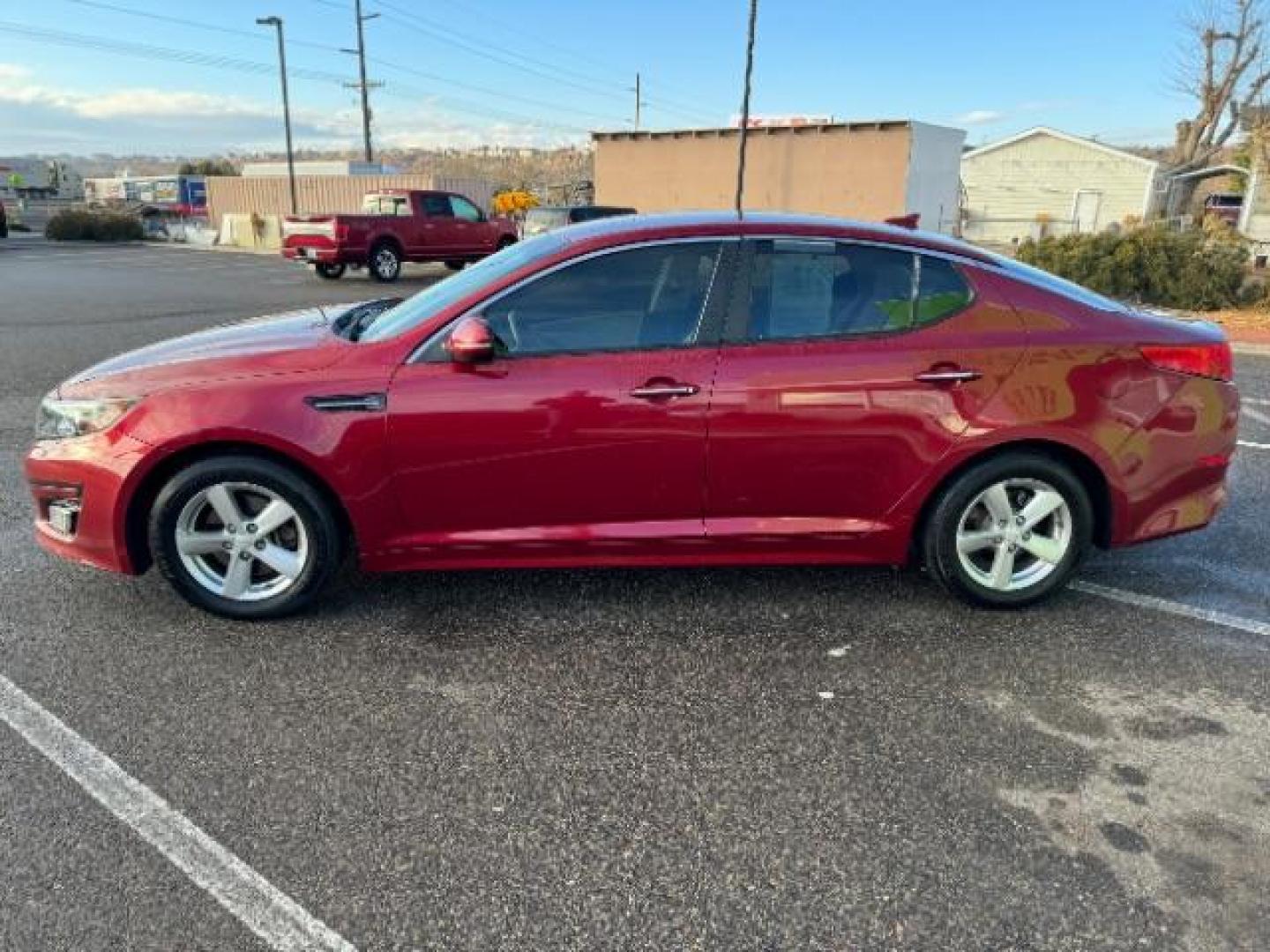 2015 Dark Cherry /Black Kia Optima LX (5XXGM4A78FG) with an 2.4L L4 DOHC 16V engine, 6-Speed Automatic transmission, located at 1865 East Red Hills Pkwy, St. George, 84770, (435) 628-0023, 37.120850, -113.543640 - Photo#5