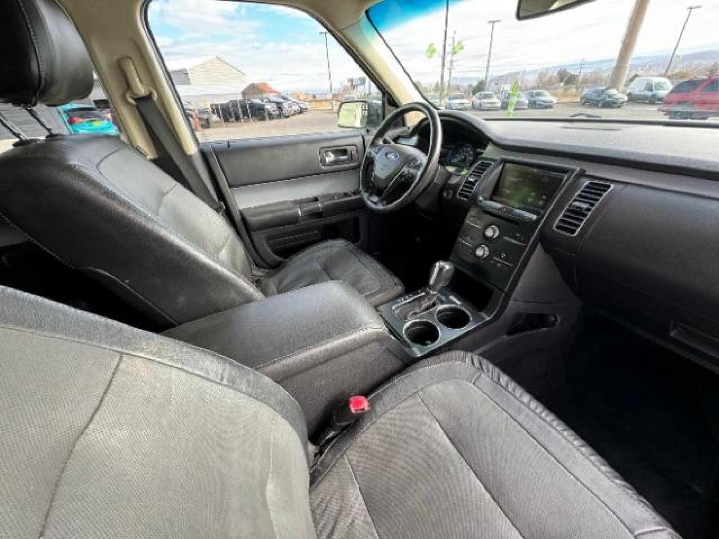 2015 Ingot Silver Metallic /Charcoal Black, leather Ford Flex SEL FWD (2FMGK5C88FB) with an 3.5L V6 DOHC 24V engine, 6-Speed Automatic Overdrive transmission, located at 1865 East Red Hills Pkwy, St. George, 84770, (435) 628-0023, 37.120850, -113.543640 - Photo#39