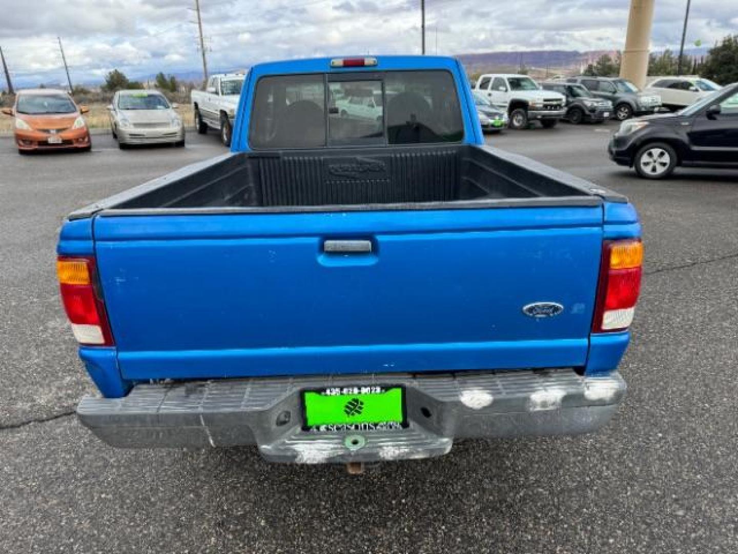 1999 Bright Atlantic Blue Clearcoat Metallic /Medium Graphite Cloth Ford Ranger XL SuperCab 2WD (1FTYR14V0XT) with an 3.0L V6 OHV 12V FFV engine, 4-Speed Automatic transmission, located at 1865 East Red Hills Pkwy, St. George, 84770, (435) 628-0023, 37.120850, -113.543640 - Photo#6