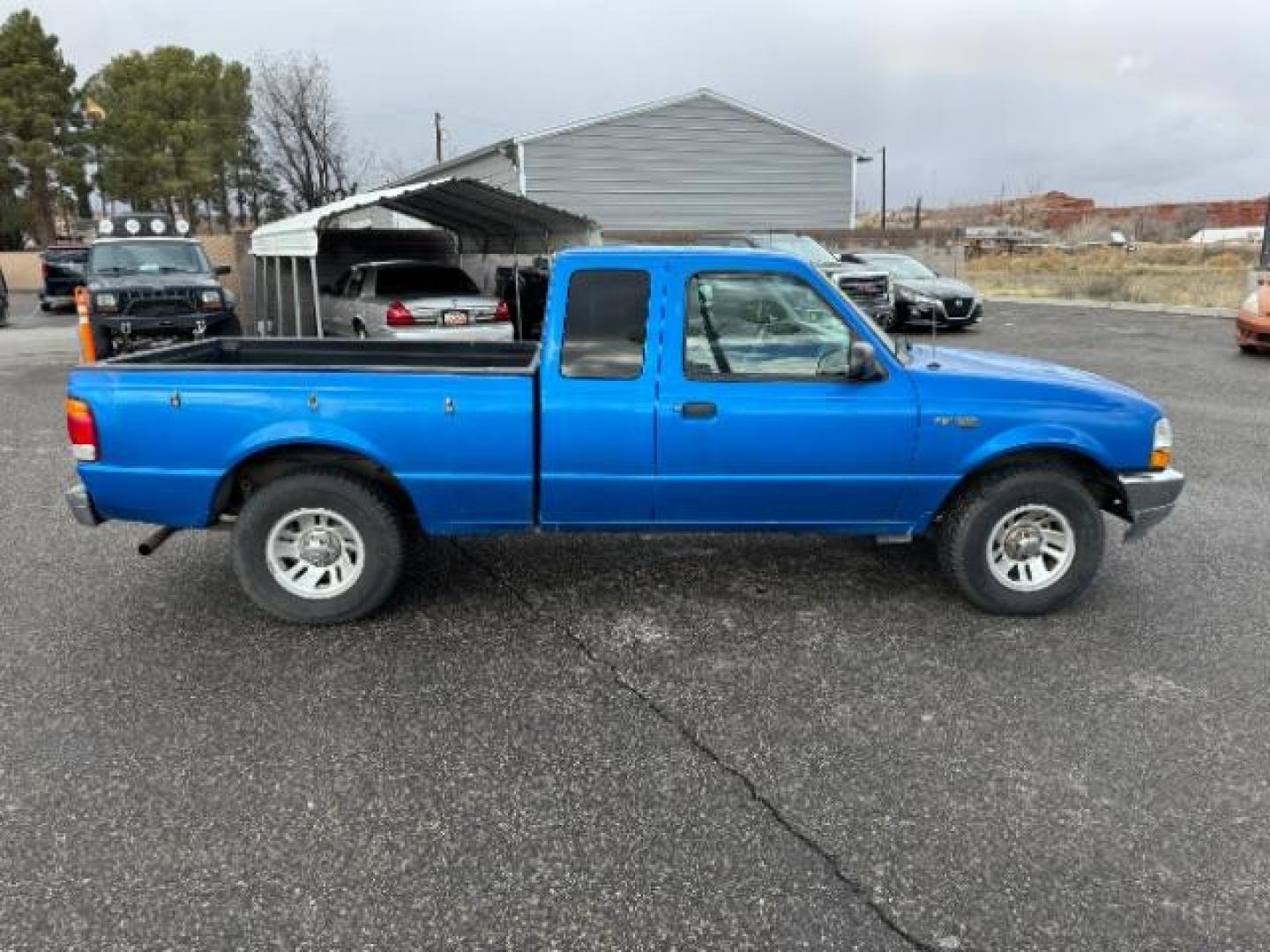 1999 Bright Atlantic Blue Clearcoat Metallic /Medium Graphite Cloth Ford Ranger XL SuperCab 2WD (1FTYR14V0XT) with an 3.0L V6 OHV 12V FFV engine, 4-Speed Automatic transmission, located at 1865 East Red Hills Pkwy, St. George, 84770, (435) 628-0023, 37.120850, -113.543640 - Photo#8